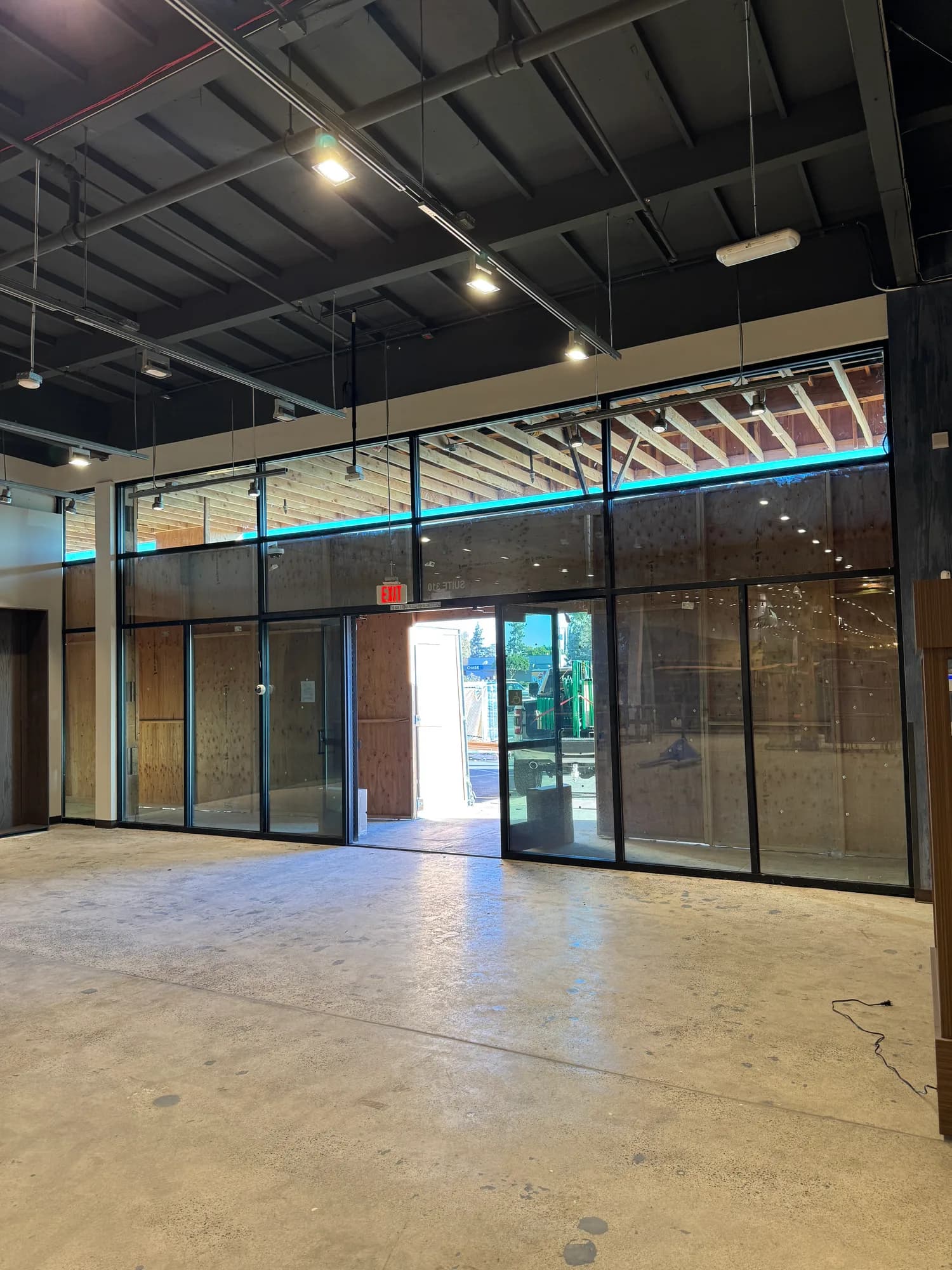 Filmed storefront glass wall inside the Boot Barn retail build-out in Turlock CA